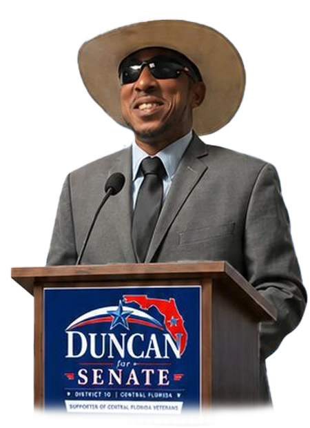 H.A. Duncan speaking behind a podium